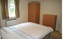 Bedroom of modern fully-furnished apartment in central Oxford